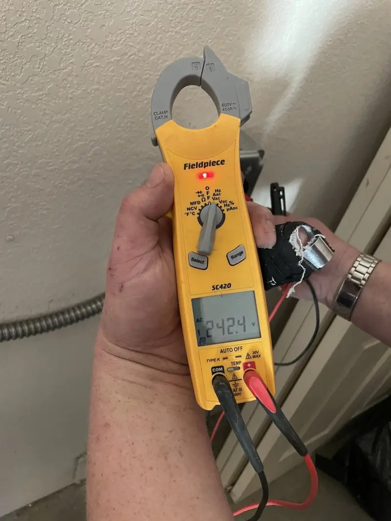 Voltage testing with clamp meter during Generator Installation in Springville